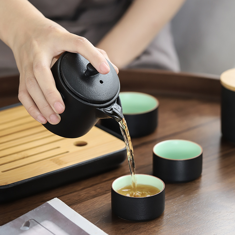 Su ceramic Japanese black pottery to crack a pot of a three portable travel kung fu tea set