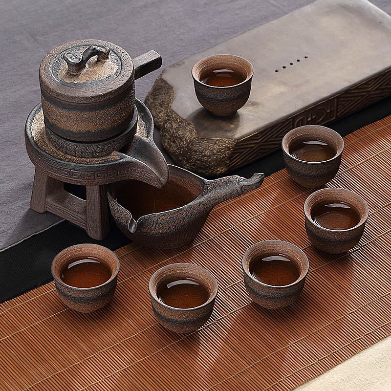 Contracted and I automatic lazy tea to implement kung fu tea set graphite coarse pottery teacup suit household ceramic teapot