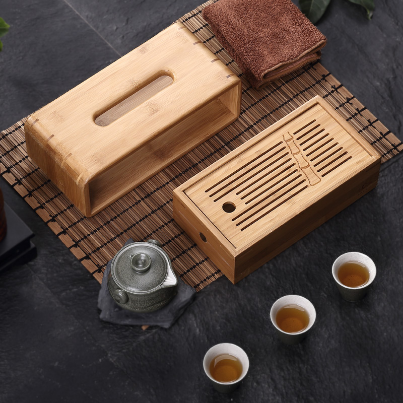 The Mini portable travel tea set is suing kung fu ceramic cups of a complete set of creative household bamboo tea tray
