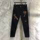 The new trend of men's personality Slim feet black hole in the head drilling hot pants jeans young men The new trend of men's personality Slim feet black hole in the head drilling hot pants jeans young men