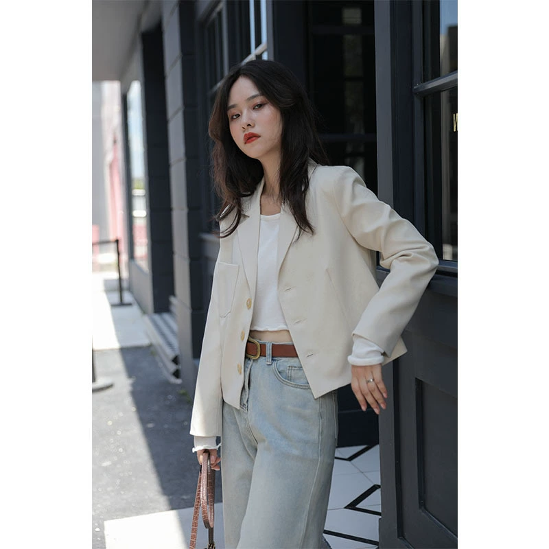 2021 mùa xuân mới phong cách Hồng Kông mặc bên ngoài tính khí phù hợp với thời trang Hàn Quốc áo khoác dài tay ngắn màu trắng rộng rãi phụ nữ - Business Suit