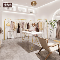 Clothes shelves clothing store corner wall-mounted gold display rack decoration renderings womens clothing store display rack