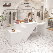 Clothing store in the middle of the table and display creative decoration design Han Feng soft display liu shui tai womens clothing store showcase