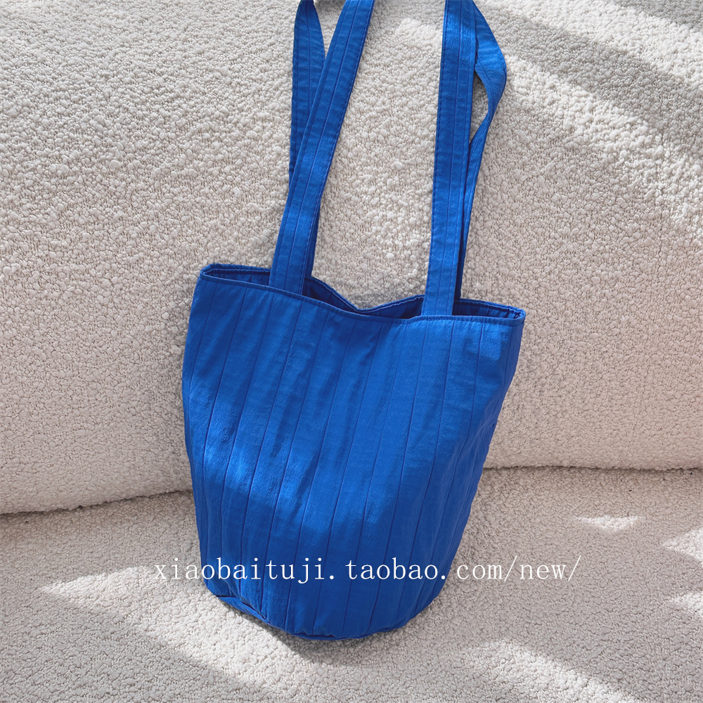 Taojiyun Buying Little White Rabbit shoulder bag, striped pleated solid color bucket bag, niche minimalist women's tote shopping bag.- Taojiyun | Taiwan consolidation | Taobao product purchasing | China goods purchasing | Gather and Transport