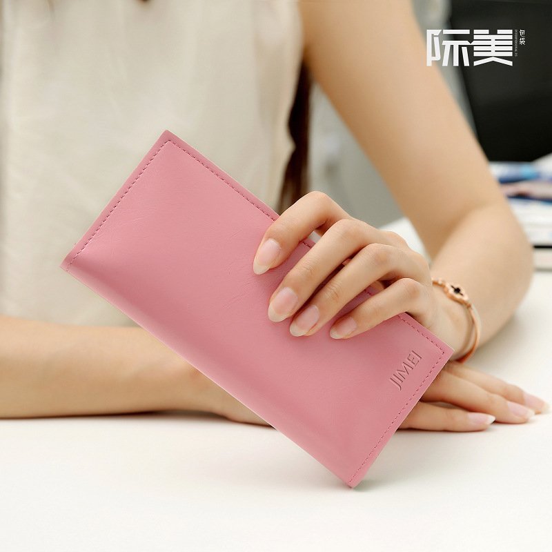 A new leather clip lady multi-position slim fashion money clip women's style long version of soft leather handbag student tide