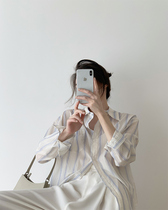 Korean version of loose vertical striped shirt design sense small-scale Fuguang flavor Joker long-sleeved lapel stacked on top