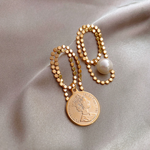 Sturbolea asymmetric head pearl earrings female European and American fashion temperament personality niche design ear jewelry