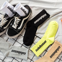 Socks for men and women long tube Korean version of the trend students in the socks sports Spring and Autumn Winter letters high-top stockings mens high socks