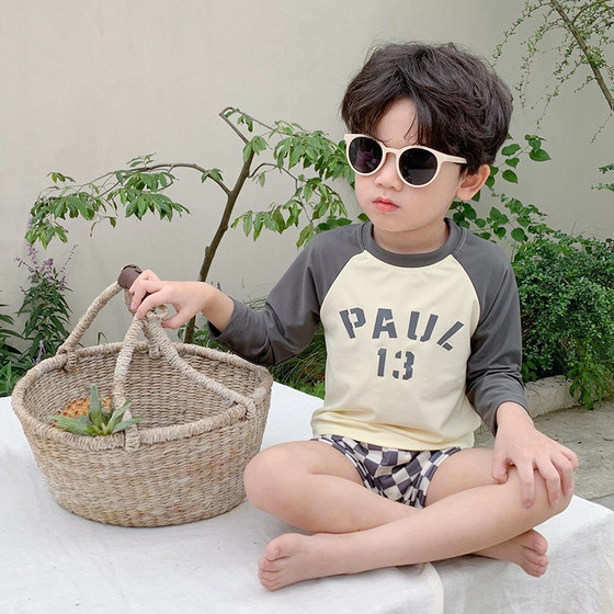 Korean version of ins children's long-sleeved quick-drying swimsuit summer shorts medium-large children's hot spring beach fake travel set
Korean version of ins children's long-sleeved quick-drying swimsuit summer shorts medium-large children's hot spring beach fake travel set