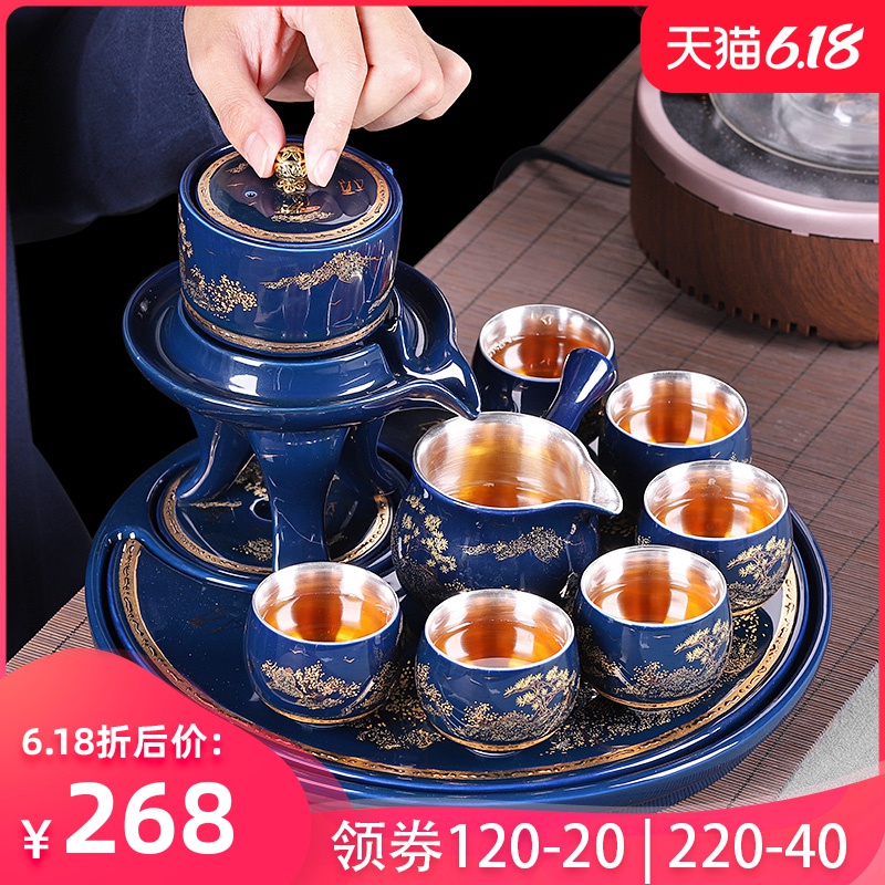 Jingdezhen kung fu tea set tea tray was stone mill rotating lazy automatic water ji blue office receives a visitor make tea