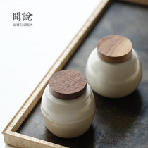 Wen said) Japanese kapok white tea jar Jingdezhen municipal walnut cover sealed portable small tea warehouse