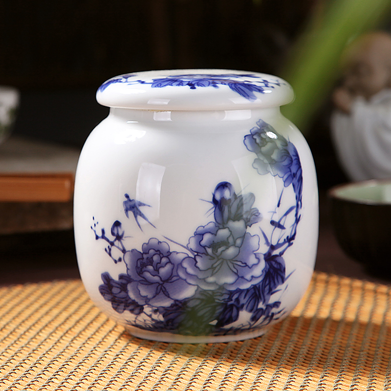 The Crown, jingdezhen ceramic blue and white porcelain tea pot small POTS sealed tank storage as cans of 140 grams of tieguanyin