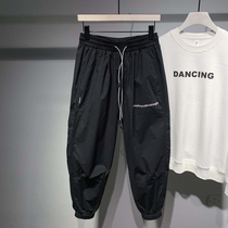 Tlinlu Japanese sports fashion drawstring thin section casual pants mens autumn and summer small letters loose leg pants men