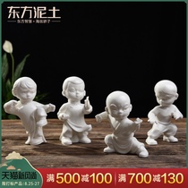 Oriental clay kung fu boy character decoration Dehua white porcelain sculpture art creative living room partition decoration