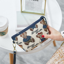 Next door Xiaofei large capacity Korean version of the joker clutch 2019 new cartoon jacquard womens bag cosmetic bag