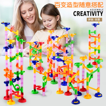 Children plugging large particles and assembling boys' puzzle girls' ball orbit sliding laby toys small