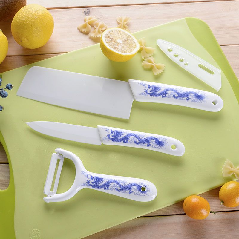 Plastic handle ceramic knife carving knife slicing knife chopper don 't rust antioxidant household kitchen three - piece suit.