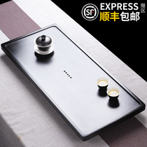 Rock art whole piece natural black gold stone tea tray Household modern polished stone grinding dry tea table Small tea sea tray