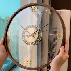 Solid wood living room wall clock household high-end clock simple modern restaurant light luxury clock wall hanging new Chinese style new style