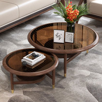 Nordic minimalist rock plate round tea table combined small family type living room solid wood tempered glass personality storage tea table