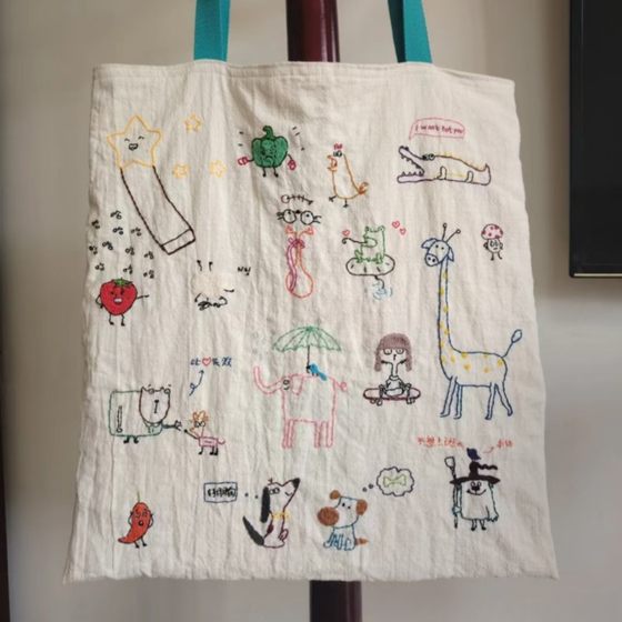 Japanese creative graffiti embroidered canvas bag 2025 new lazy and relaxing versatile handbag commuter shoulder bag
Japanese creative graffiti embroidered canvas bag 2025 new lazy and relaxing versatile handbag commuter shoulder bag