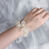 Brides wrist flower high-end wedding bridesmaid group Sen pearl bracelet sister group hand flower ins wind super fairy beauty