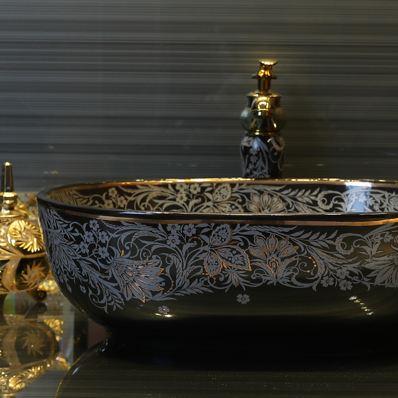 Gold cellnique black ceramic contracted art on the stage of the basin that wash a face basin of Chinese style sink basin of wash one 's hands and oval