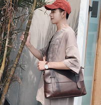 Hong Kongs latest Korean version of mens leather handbag casual briefcase for young retro back single shoulder bag