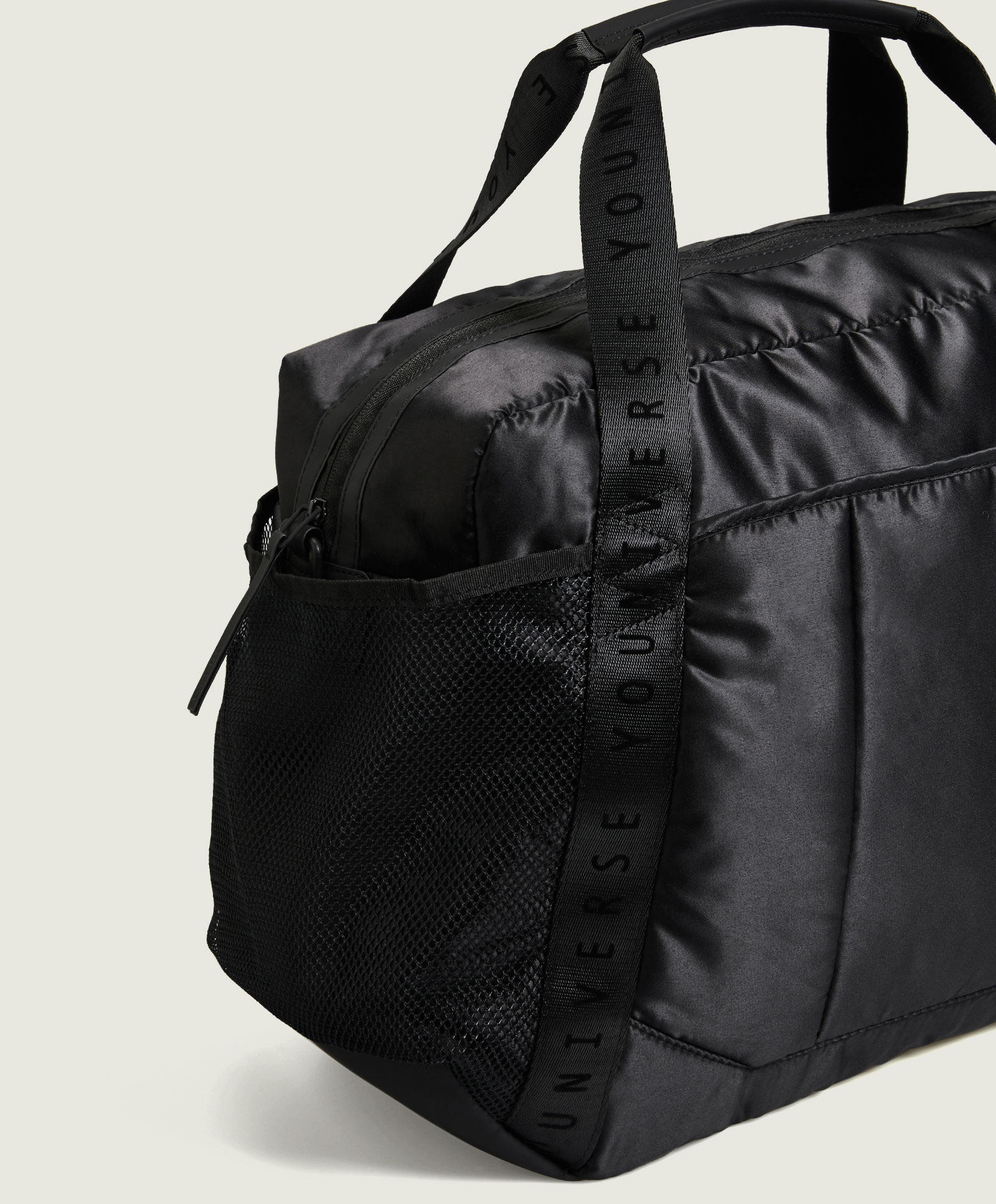 oysho youniverse 系列黑色时尚尼龙布软质运动包 13041364040