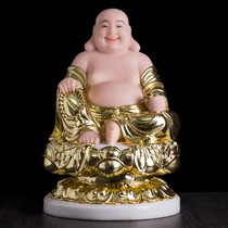 The Gold White Jade Maitreya Buddha statue is enshrined and laughed at the Buddha.