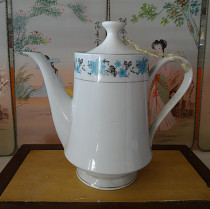 Old teapot in the 1980s elegant flower pattern nostalgic collection of film and television props