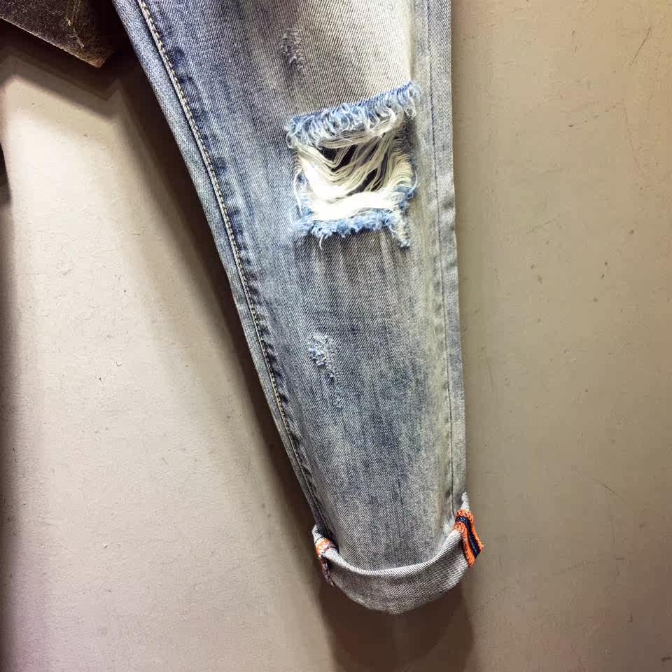 欧货潮男新款羽毛刺绣贴布破洞牛仔裤蓝色水洗修身中腰乞丐长裤薄