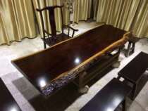Black gold sandalwood large plate log tea table tea table tea table and chairs combined new Chinese boss desk whole plate 2 m spot