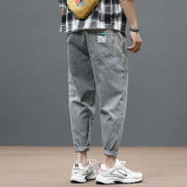 Tide cards spring 90% pants jeans Mens loose big code Korean version Trend casual Harun pants small foot pants thin