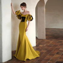 A word shoulder evening dress high - end luxury small satin fish tail hosts dress 2023 new bride toast suit