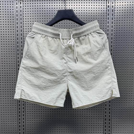 Summer thin ice silk fast dry shorts men's 2024 tide brand casual triple pants couple drawing rope solid color beach pants Summer thin ice silk fast dry shorts men's 2024 tide brand casual triple pants couple drawing rope solid color beach pants