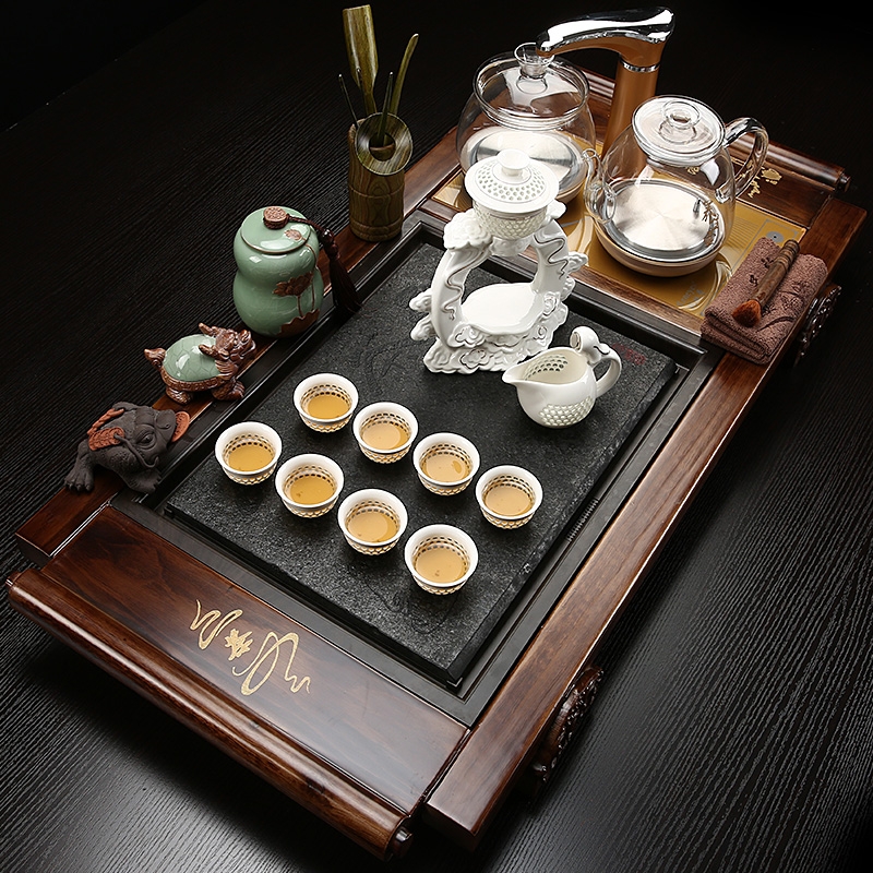 Qiao mu kung fu of a complete set of ceramic tea set domestic glass automatic induction cooker real wood sharply stone tea tray