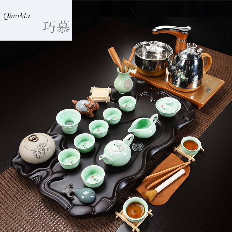 Qiao mu four one automatic tea tray tea table of a complete set of ceramic household contracted kung fu tea set tea cups