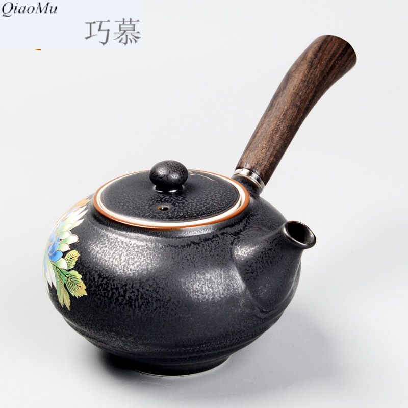 Qiao mu ancient tea exchanger with the ceramics glaze the teapot with wooden handle, side put the pot of kung fu tea set with parts by hand