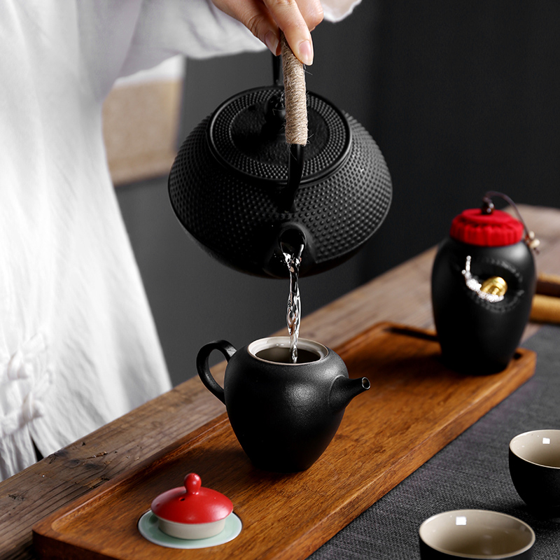 Sand embellish ceramic travel tea set of black suit and contracted Japanese ceramic vehicle is suing teapot portable package