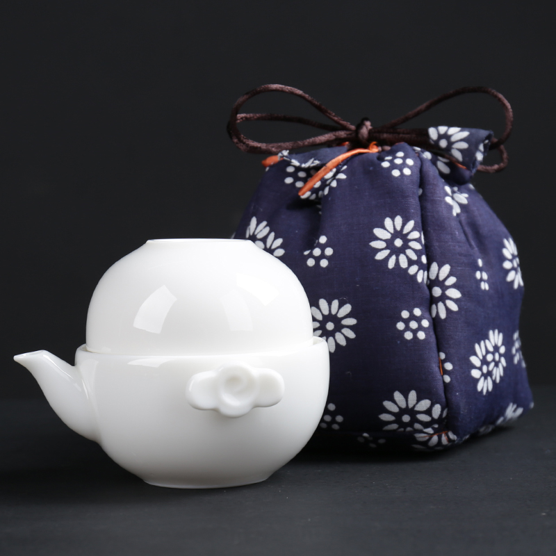 White porcelain crack of a pot of the 122 cup of household ceramic teapot portable travel kung fu tea set to send gifts