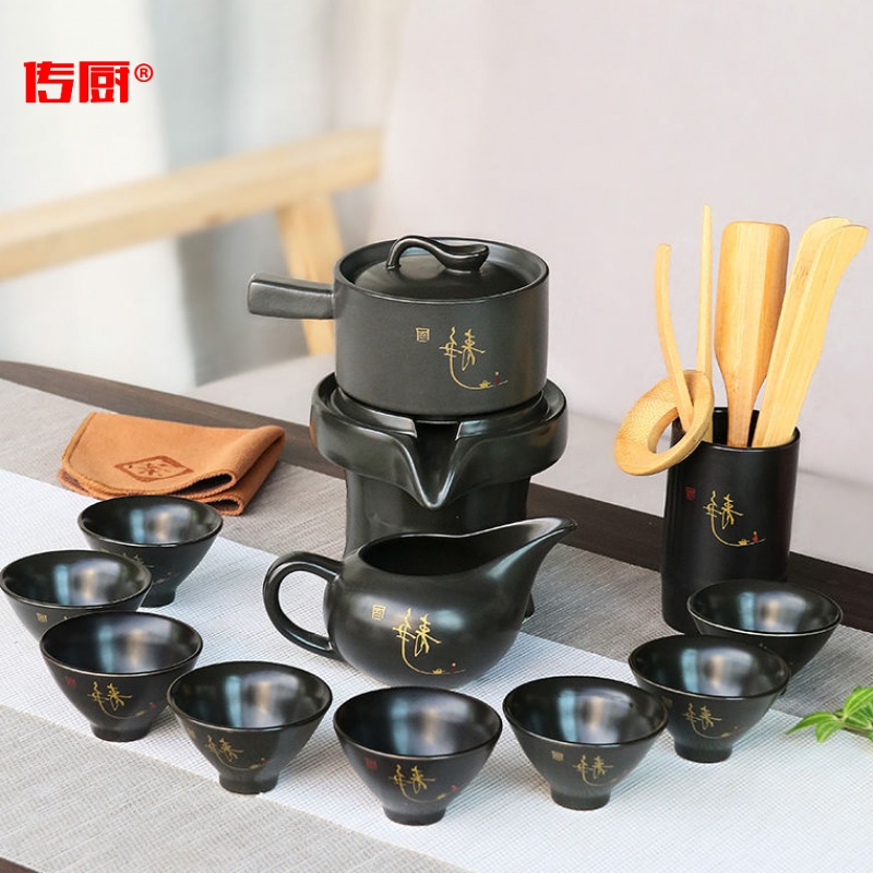 The kitchen household ceramic teapot rotating out of The water of a complete set of lazy semi - automatic purple sand tea set suit creative kung fu