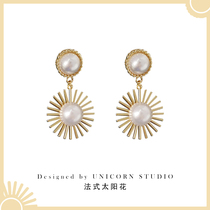 Round geometric metal pearl earrings high-end light luxury fashion personality sun earrings cold wind silver needle earrings