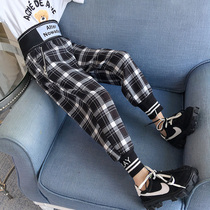 Girls fashionable black and white plaid pants spring and autumn 2021 New Korean version of childrens casual pants trousers autumn