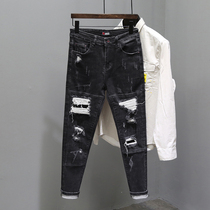 Black gray mens jeans Tide brand Autumn New beggar hole patch slim feet Korean trend trousers