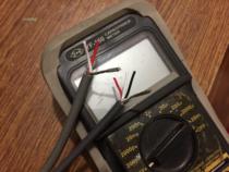 Audio signal machine overhang band shielding wire