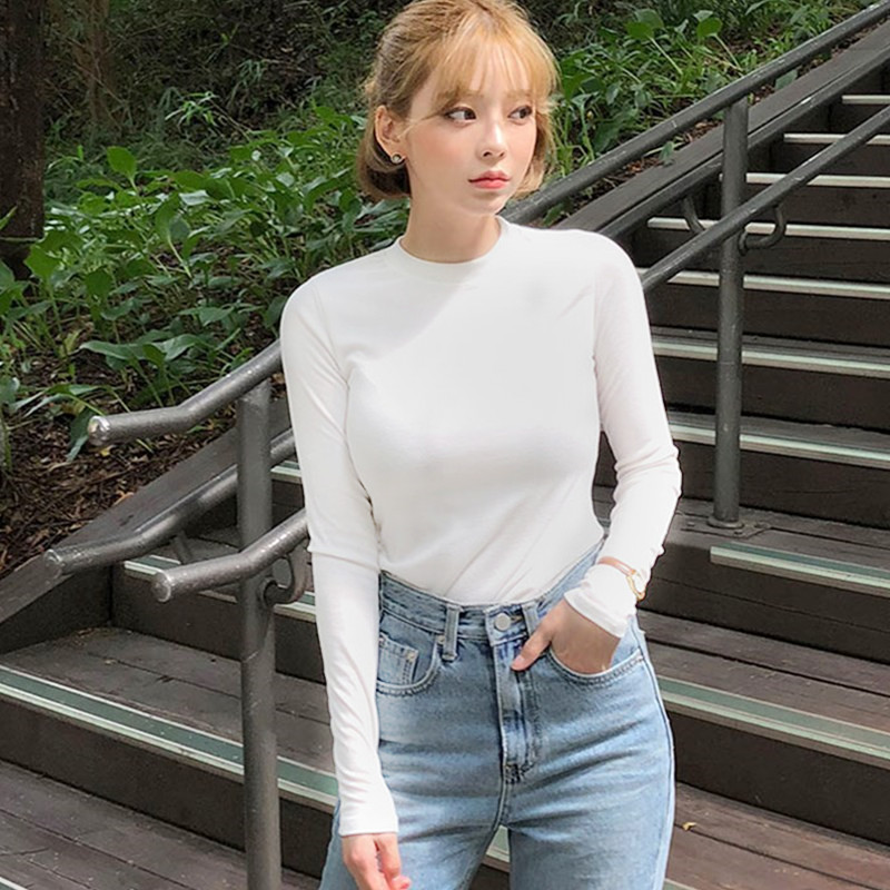 images 0:In early autumn, the black underpacked female long-sleeved t-shirt half-high-collar man in his body images 0:In early autumn, the black underpacked female long-sleeved t-shirt half-high-collar man in his body
