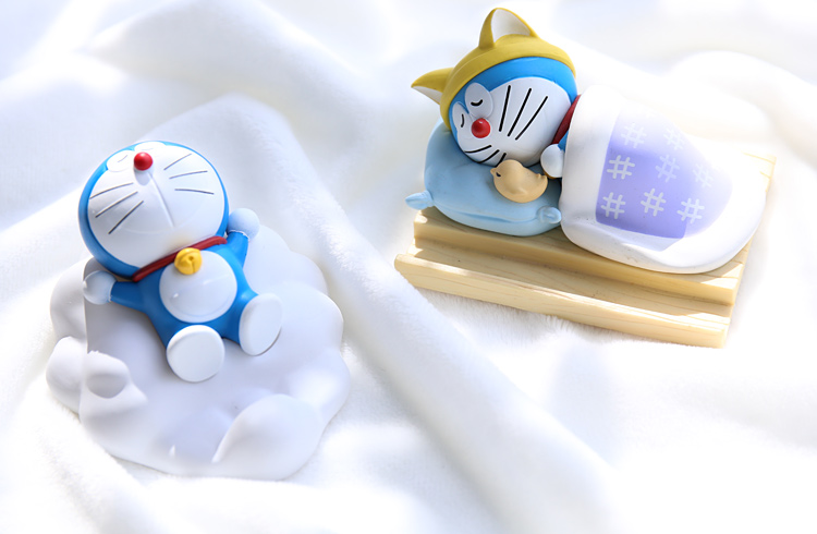 艾影正版萌机器猫睡觉哆啦a梦手机座车载支架叮当猫手办创意礼品