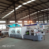 Automatic edge banding machine grade East water pump with tracking belt pre-milling double repair large high-speed automatic edge banding machine
