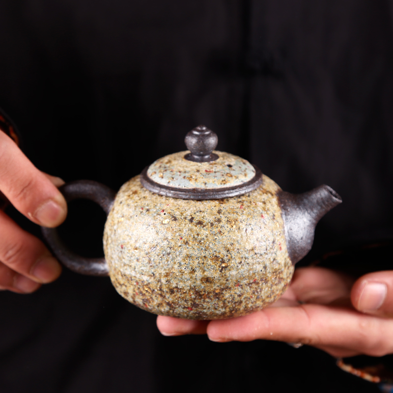 Ancient undressed ore Taiwan sheng up manually lava coarse pottery tea teapot to burn natural fire rock ore ball hole, single pot